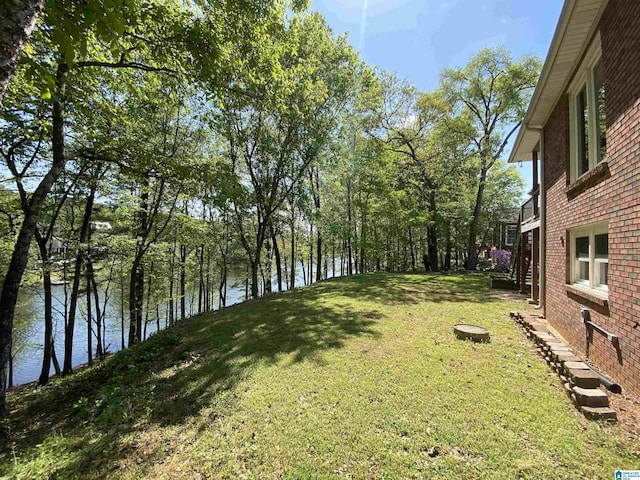 view of yard with a water view