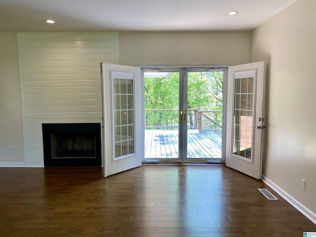 entryway with recessed lighting, visible vents, french doors, dark wood-type flooring, and baseboards