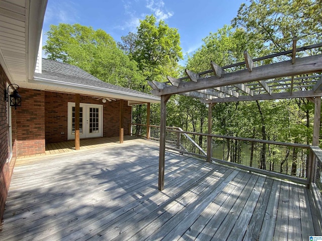 deck with a pergola and french doors