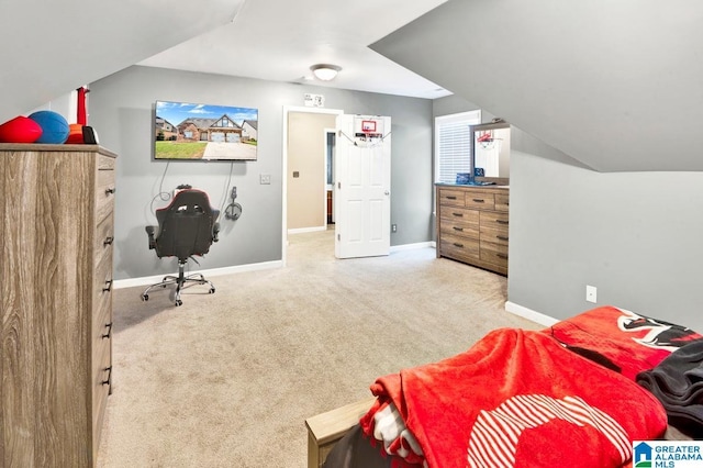 carpeted bedroom featuring baseboards