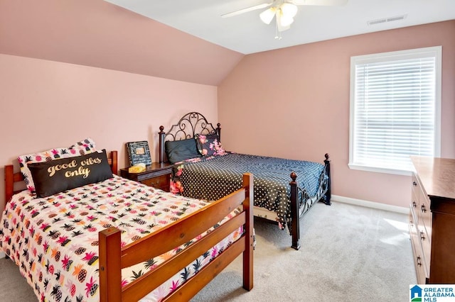 bedroom with baseboards, visible vents, carpet flooring, and ceiling fan