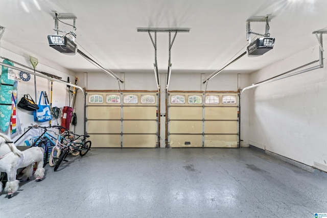 garage featuring a garage door opener