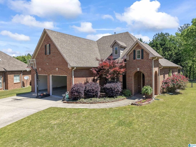 traditional-style house with an attached garage, brick siding, roof with shingles, and concrete driveway