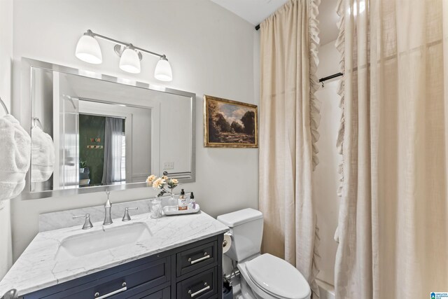bathroom with vanity and toilet