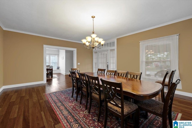 109 N 1st St N, Oneonta, AL 35121 - dining room featuring a notable chandelier, dark wood finished floors, baseboards, visible vents, and ornamental molding