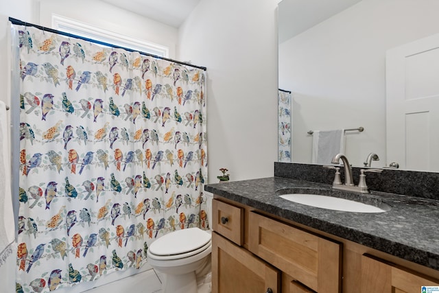 bathroom with tile patterned flooring, toilet, a shower with curtain, and vanity