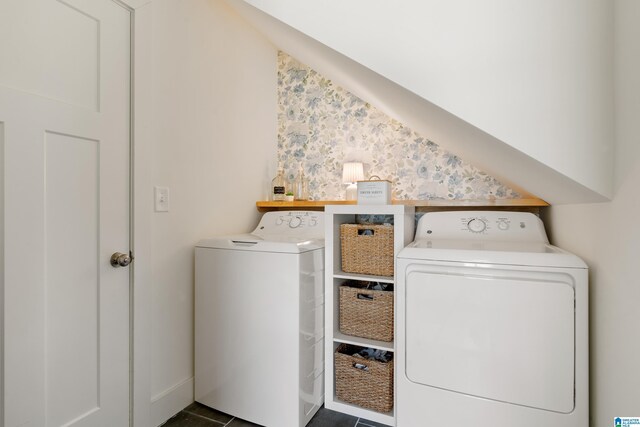 laundry area featuring washing machine and dryer, wallpapered walls, and laundry area