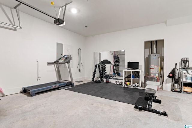 workout area with water heater and a garage