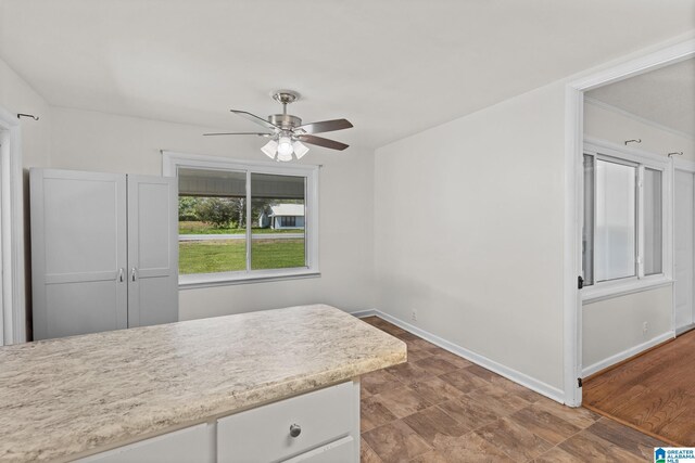 7096 US Highway 231, Cropwell, AL 35054 - unfurnished dining area featuring baseboards and a ceiling fan