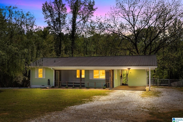 7096 US Highway 231, Cropwell, AL 35054 - view of front of property with fence, a front lawn, driveway, an attached carport, and metal roof