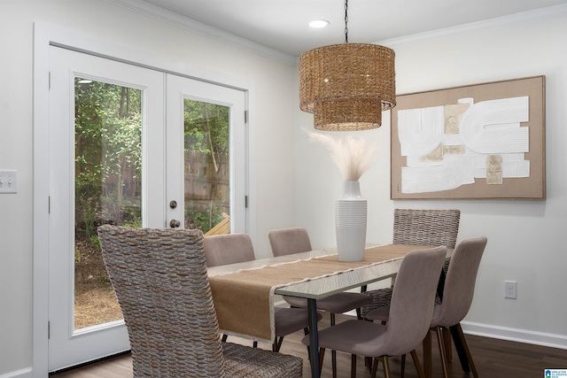dining area with recessed lighting, wood finished floors, crown molding, baseboards, and french doors