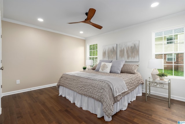 bedroom with dark wood-type flooring, crown molding, recessed lighting, and baseboards