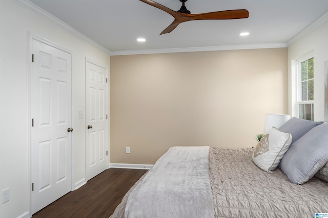 bedroom featuring crown molding, baseboards, dark wood finished floors, and recessed lighting