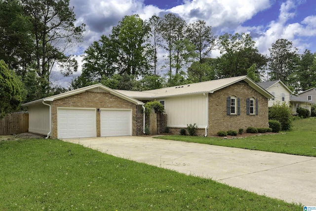 ranch-style home featuring a garage, brick siding, a front yard, and concrete driveway