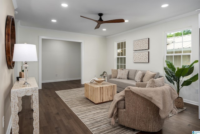 living area featuring baseboards, recessed lighting, ornamental molding, dark wood finished floors, and a ceiling fan