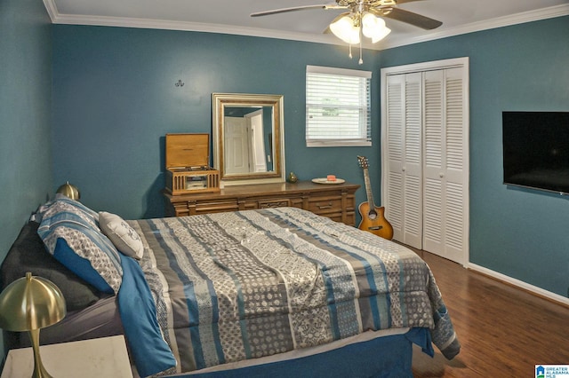 bedroom featuring a closet, crown molding, and baseboards