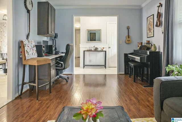 office space featuring wood finished floors and ornamental molding