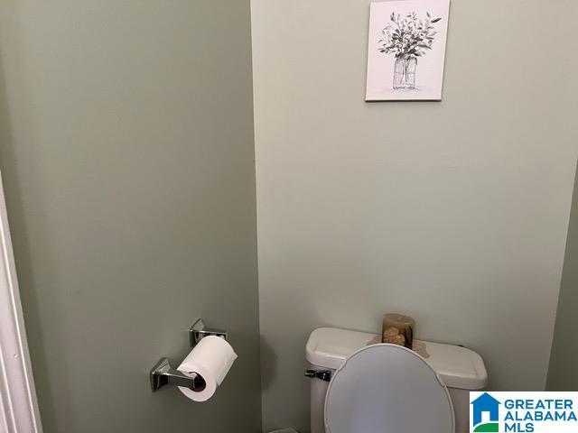 half bathroom with toilet