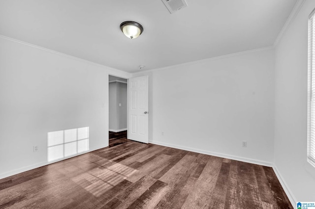 300 6th St, Docena, AL 35060 - unfurnished room featuring wood finished floors, visible vents, crown molding, and baseboards