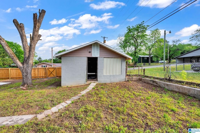 300 6th St, Docena, AL 35060 - view of shed featuring a fenced backyard