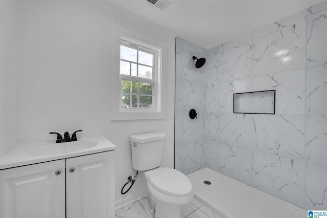300 6th St, Docena, AL 35060 - full bathroom with visible vents, a marble finish shower, toilet, and vanity