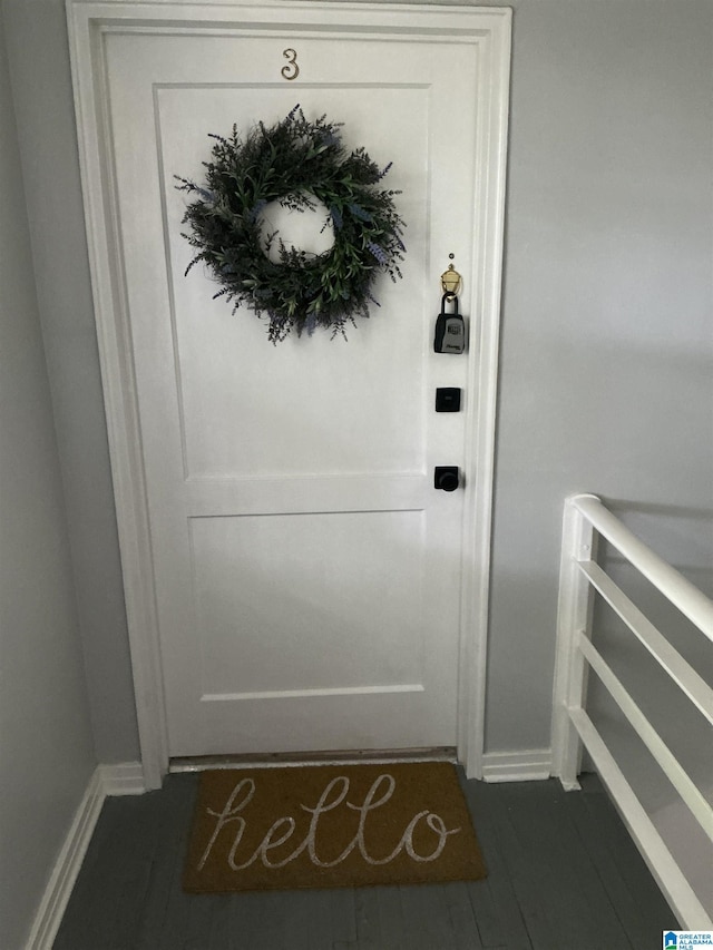 doorway to property featuring radiator heating unit
