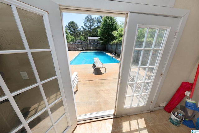 view of swimming pool featuring a fenced in pool
