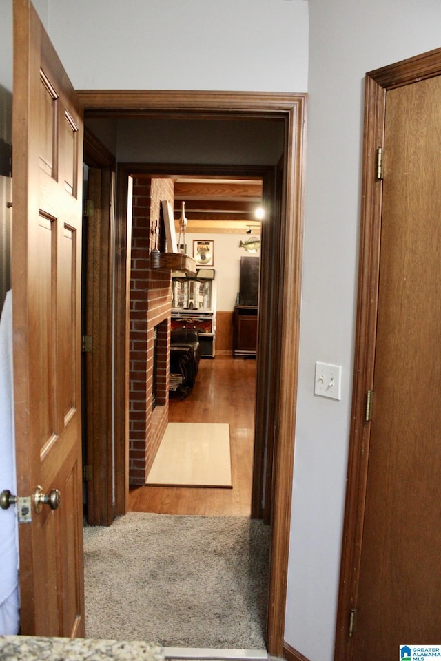 hall featuring wood finished floors