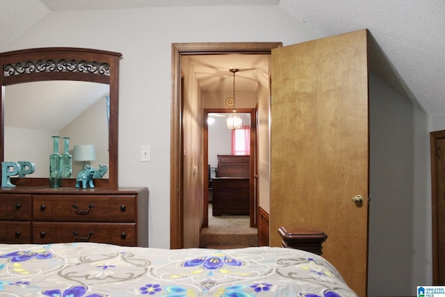 bedroom featuring vaulted ceiling