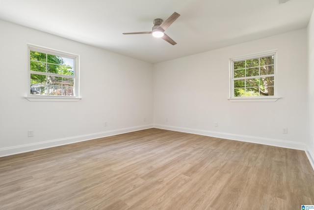 1515 Spring St, Alexander City, AL 35010 - spare room featuring light wood finished floors, baseboards, and ceiling fan
