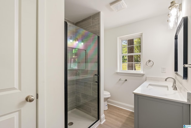 1515 Spring St, Alexander City, AL 35010 - full bathroom featuring toilet, a stall shower, visible vents, baseboards, and vanity