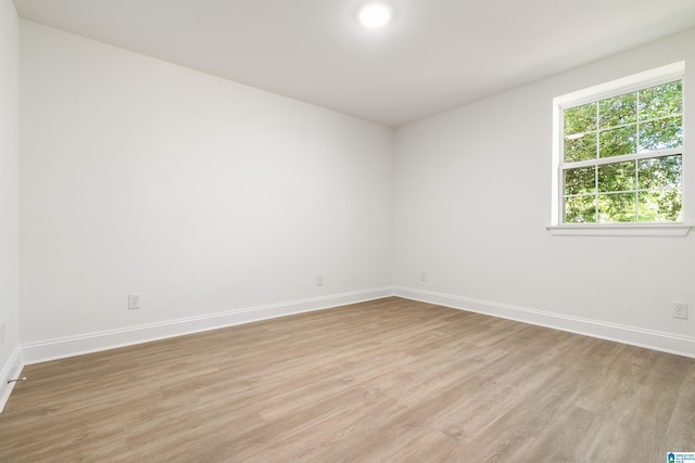 1515 Spring St, Alexander City, AL 35010 - unfurnished room with baseboards and light wood-style floors