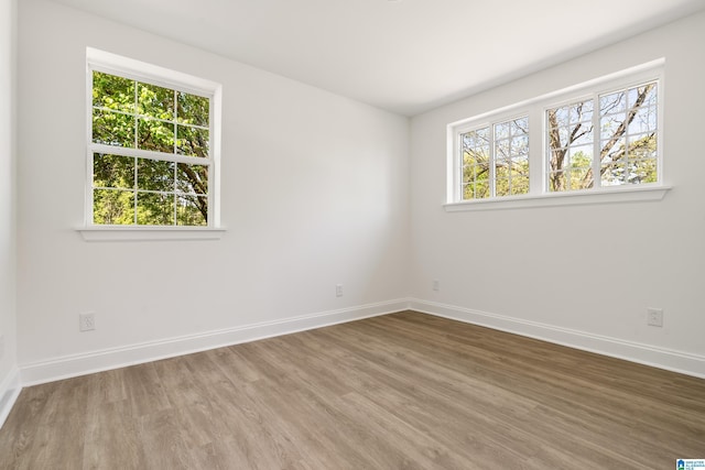 1515 Spring St, Alexander City, AL 35010 - unfurnished room featuring baseboards and wood finished floors