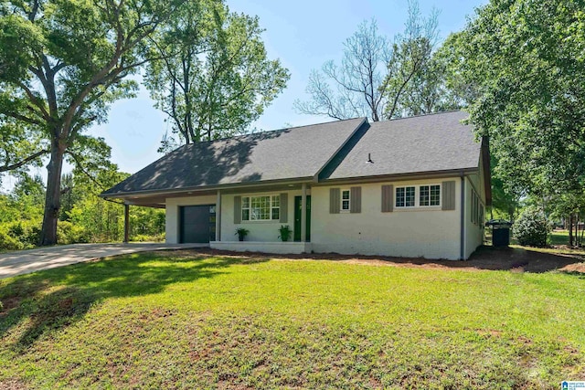 1515 Spring St, Alexander City, AL 35010 - ranch-style house featuring an attached garage, a shingled roof, a front yard, and concrete driveway