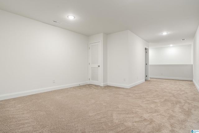 1515 Spring St, Alexander City, AL 35010 - basement with baseboards, visible vents, recessed lighting, and light colored carpet