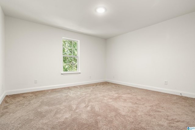 1515 Spring St, Alexander City, AL 35010 - carpeted empty room featuring baseboards