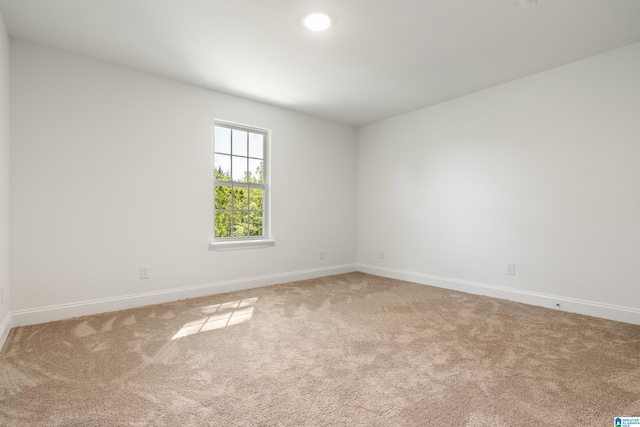 1515 Spring St, Alexander City, AL 35010 - carpeted empty room featuring baseboards