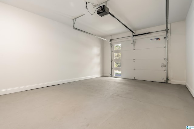 1515 Spring St, Alexander City, AL 35010 - garage with a garage door opener and baseboards
