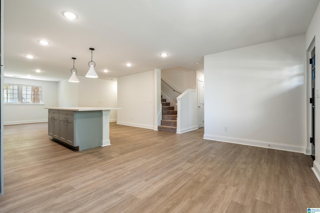 1515 Spring St, Alexander City, AL 35010 - kitchen with baseboards, open floor plan, gray cabinetry, and recessed lighting