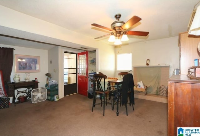 801 Walnut St, Talladega, AL 35160 - dining space with a ceiling fan and carpet flooring