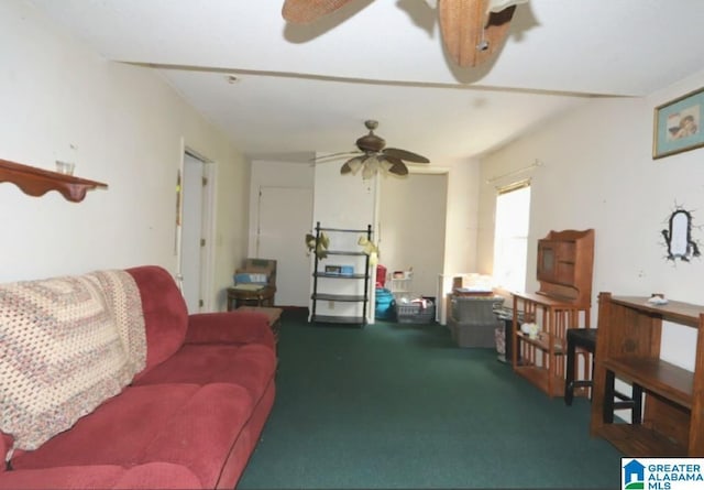 801 Walnut St, Talladega, AL 35160 - living area featuring ceiling fan and carpet flooring