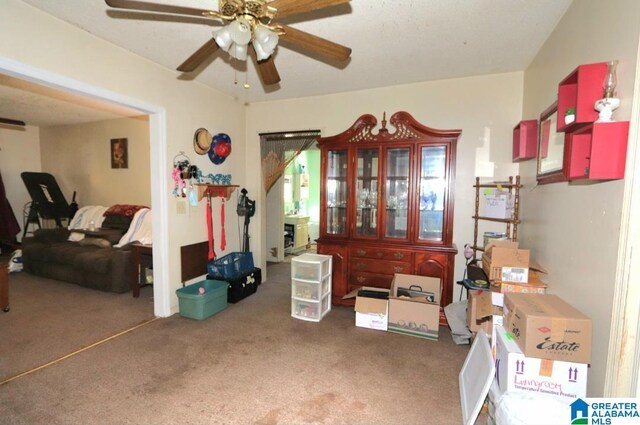 801 Walnut St, Talladega, AL 35160 - interior space with carpet flooring and a ceiling fan