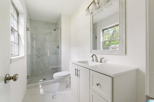 bathroom featuring vanity, marble finish floor, toilet, baseboards, and a marble finish shower