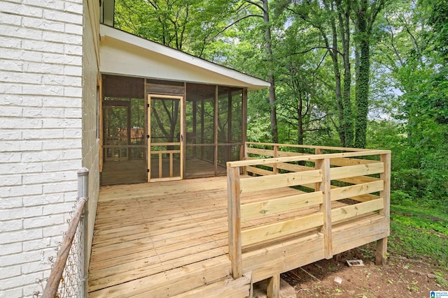 wooden terrace with a sunroom