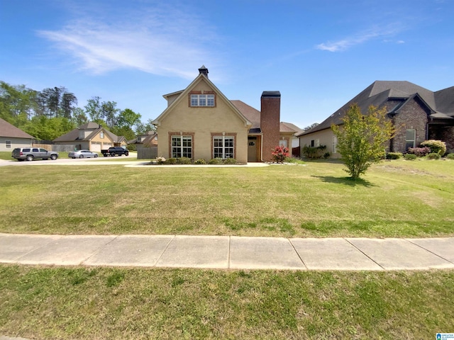 131 Willow View Ln, Wilsonville, AL 35186 - exterior space with a chimney and a front yard