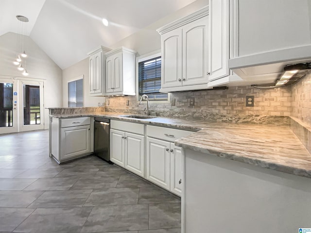131 Willow View Ln, Wilsonville, AL 35186 - kitchen with lofted ceiling, backsplash, a sink, a peninsula, and white cabinetry