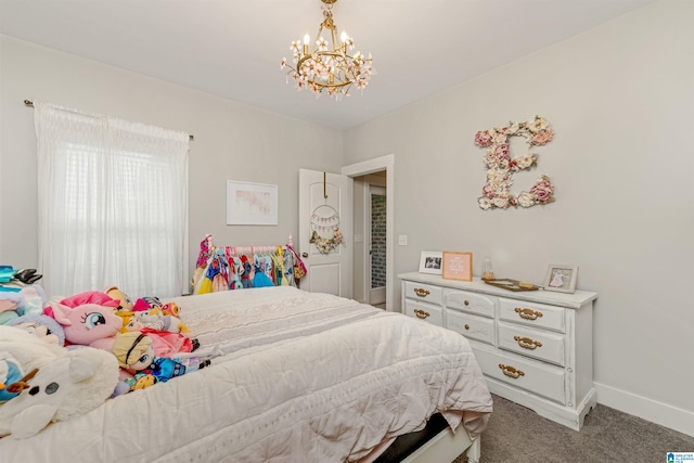 carpeted bedroom with an inviting chandelier and baseboards