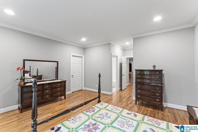bedroom featuring baseboards, recessed lighting, wood finished floors, and crown molding