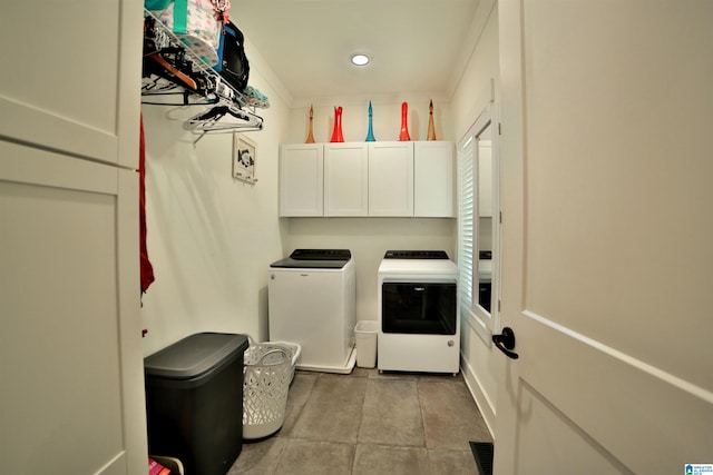 laundry area with recessed lighting, cabinet space, independent washer and dryer, and visible vents