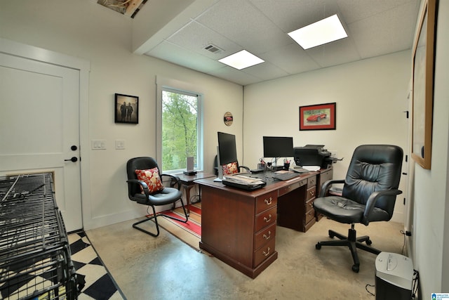 office with visible vents, finished concrete floors, and baseboards
